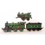 An O gauge 4-4-0 NER locomotive and tender 1620 in green livery named Gateshead 1893 North British