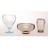 A trio of early 20th Century Whitefriars to include a Sapphire blue pedestal vase,