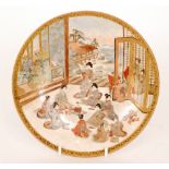 A 19th Century Japanese Meiji period Satsuma plate decorated with robed ladies and children sat in