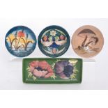 Three Moorcroft Pottery pin dish coasters comprising one in the Strawberry Thief pattern designed