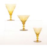 A part suite of early 20th Century drinking glasses to comprise three wine,