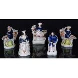 A pair of 19th Century Staffordshire figures modelled as the young Queen Victoria and Prince Albert,