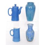 Three pieces of Powder Blue Moorcroft comprising a vase, a hot water pot and a tall milk jug,