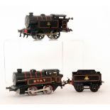 A Hornby O gauge 0-4-0 tank locomotive and tender 82011 and a modern French Hornby 0-4-0 Etat tank