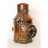 A late 19th and early 20th Century copper and brass bulkhead ships lantern,