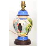 A contemporary Bizarre Craft pottery lamp base od baluster form by Rene Dale hand painted in the