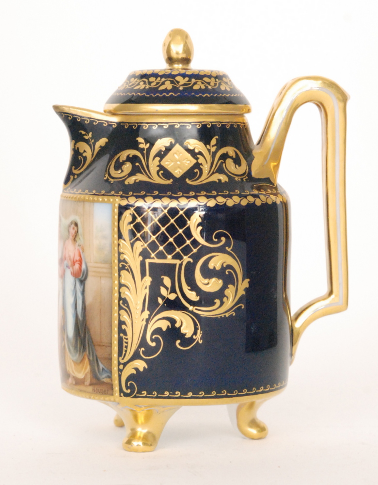 A small late 19th to early 20th Century Vienna lidded jug decorated with a hand panted scene of two