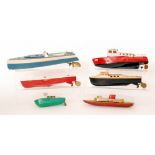 A Hornby two tone speedboat with wooden hull, a similar plastic example,
