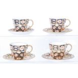 Three Royal Crown Derby coffee cups and saucers decorated in the Imari 2451 pattern together with a