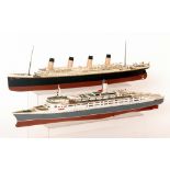 A plastic scale model of the Titanic, length 47cm, another of a Cunard liner,