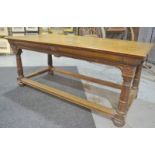 A carved oak refectory dining table in the 17th Century style,