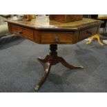 A oak drum or rent table of octagonal form,