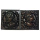 A pair of 19th Century carved oak Flemish panels of figure heads in baluster and leaf surrounds,