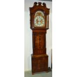 A 19th Century mahogany longcase clock with an eight day movement,