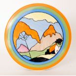 A contemporary Bizarre Craft pottery wall plaque by Marjory Higginson hand painted in the Mountain