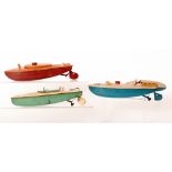 A Sutcliffe record speed boat with cream and blue hull, length 28cm,
