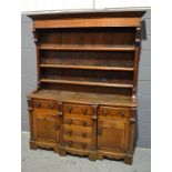 Amended description - A 19th Century oak breakfront dresser and rack,