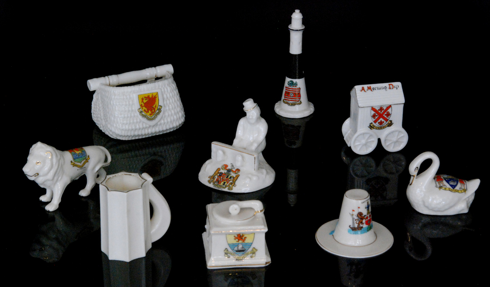 Nine pieces of assorted early 20th Century novelty crested china to include a Teignmouth crested