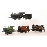 A Bing O gauge 0-4-0 locomotive and tender 4040 in black livery,
