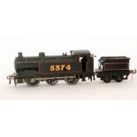 A Bassett Lowke O gauge 0-6-0 locomotive 5374 with associated tender in black livery,
