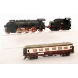 A Paya 2-6-2 O gauge electric locomotive and tender 1101 and a Sevilla coach P.