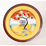 A large contemporary Bizarre Craft pottery plate by Marjory Higginson hand painted in the Applique