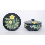 A Moorcroft Pottery powder bowl and cover decorated in the Buttercup pattern designed by Sally