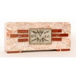 A French Art Deco mantle clock in pink veined marble case with eight day striking movement,