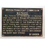 A British Transport commission cast iron trespass notice sign,