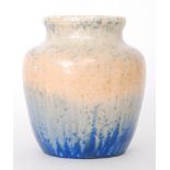 A Ruskin Pottery crystalline glaze vase of ovoid form with a flared collar neck,