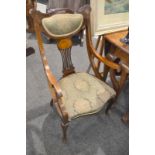 A pair of early 20th Century line inlaid mahogany salon chairs,