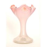 An early 20th Century Kralik glass vase with wide circular foot rising to a slender stem and wide