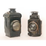 A railway black painted Adlake non sweating signal lamp with bulls eye lens,