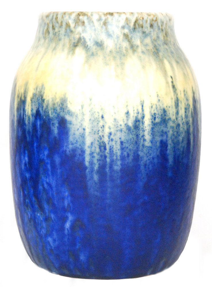 A large Ruskin Pottery crystalline glaze barrel vase decorated in green to yellow to blue,