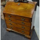 A George III mahogany feather banded fall-front bureau,