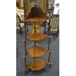 A Victorian walnut graduated four tier corner what-not,