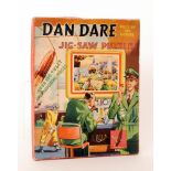 A Dan Dare jigsaw puzzle, a Pepus card game, three 1950s Eagle comics,