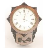 A 19th circular mahogany wall clock with single fusee movement, carved and fan shaped frame,
