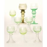 A set of four early 20th Century Continental Roemer style drinking glasses with Uranium green ovoid