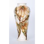 A Moorcroft Pottery Collectors Club vase decorated in the Rudbeckia pattern designed by Rachel