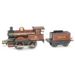 A Bing O gauge 0-4-0 Vulcan locomotive and tender 1053 in maroon livery, S/D.