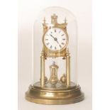 A 20th Century 365 day mantle clock, circular white dial in a glass dome,