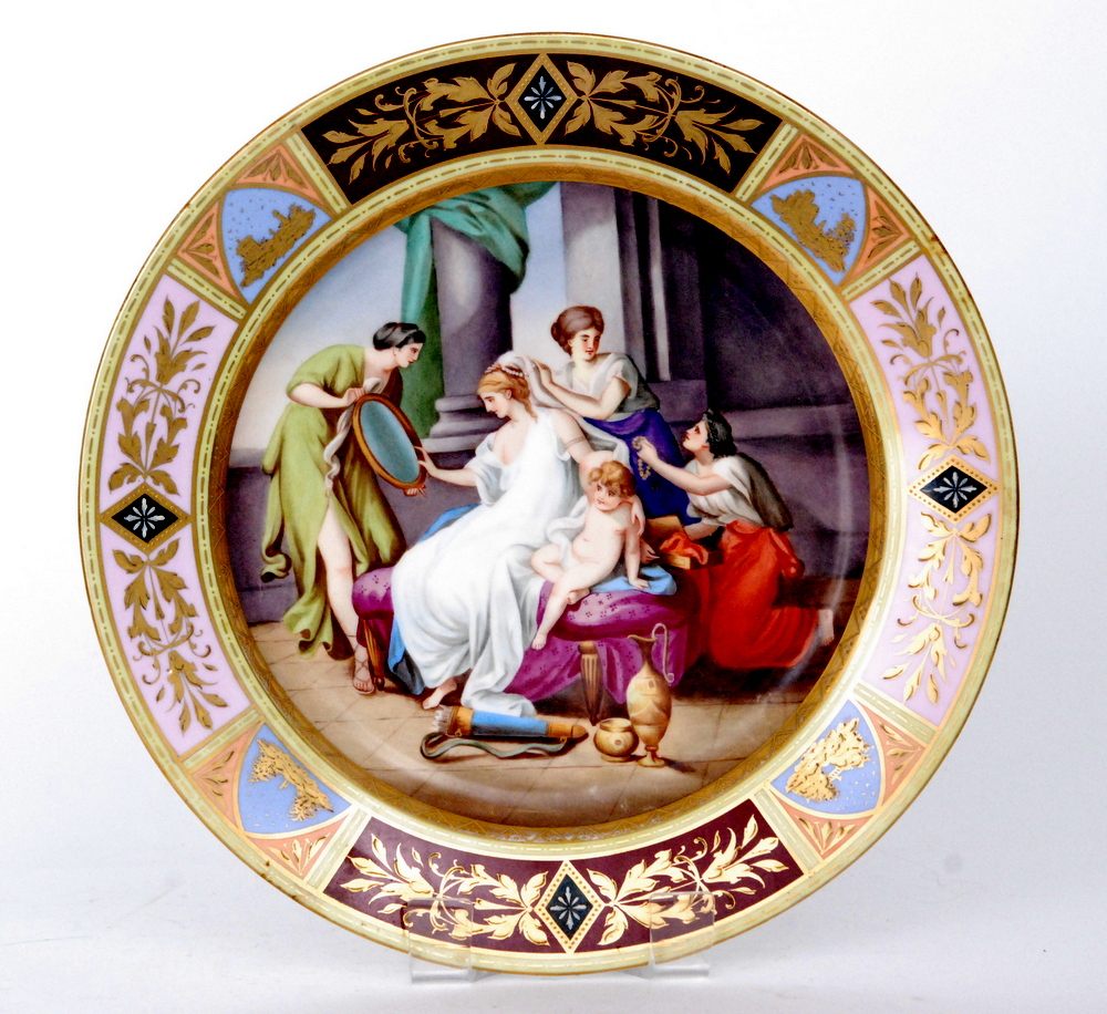 A large late 19th to early 20th Century Vienna charger decorated with a hand panted scene entitled