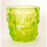 A post war Swedish glass vase by Reijmyre of barrel form with an abstract relief moulded design to