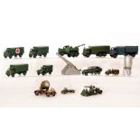 A large collection of pre and post war Dinky military vehicles to include covered lorries tanks,