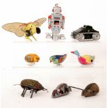 A Lehmann clockwork stag beetle, a Schuco felt covered mouse, a later Japanese tinplate mouse,