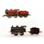 A Bing O gauge 0-4-0 LMS locomotive and tender 3734 and a 0-4-0 King George V locomotive and tender,