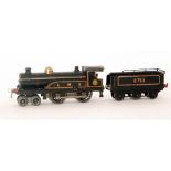 A Hornby gauge 4-4-0 LMS locomotive and tender 2711 in black livery, S/D.