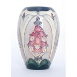 A Moorcroft Pottery vase decorated in the Foxglove pattern, designed by Rachel Bishop,