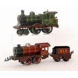 A Bing 0 gauge 4-4-0 locomotive 410 in green livery and a similar 0-4-0 tank locomotive 4429 with